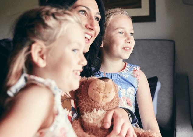 Family in hotel bedroom