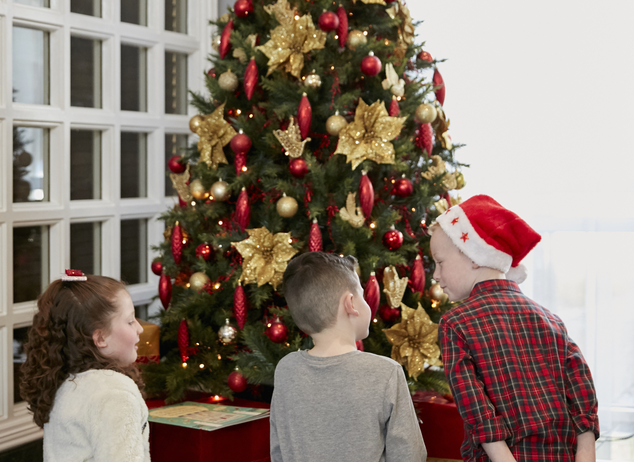 Hotel Family in Lobby at Christmas