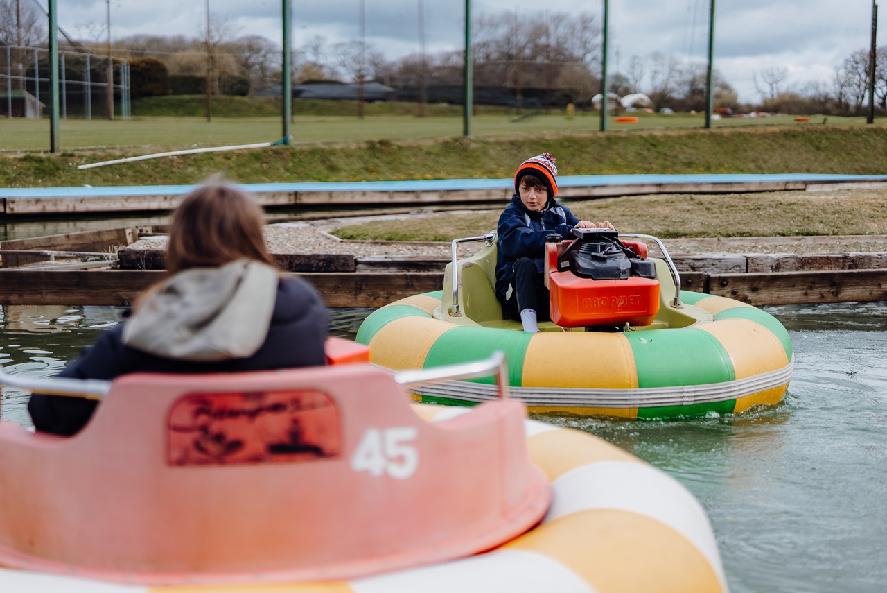 Family activity on bumper boats