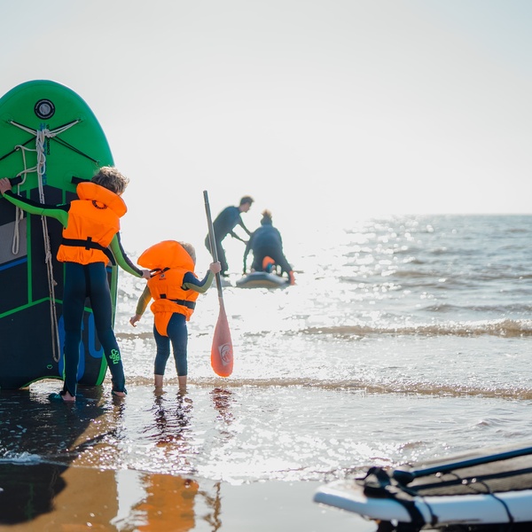 Family paddle boarding