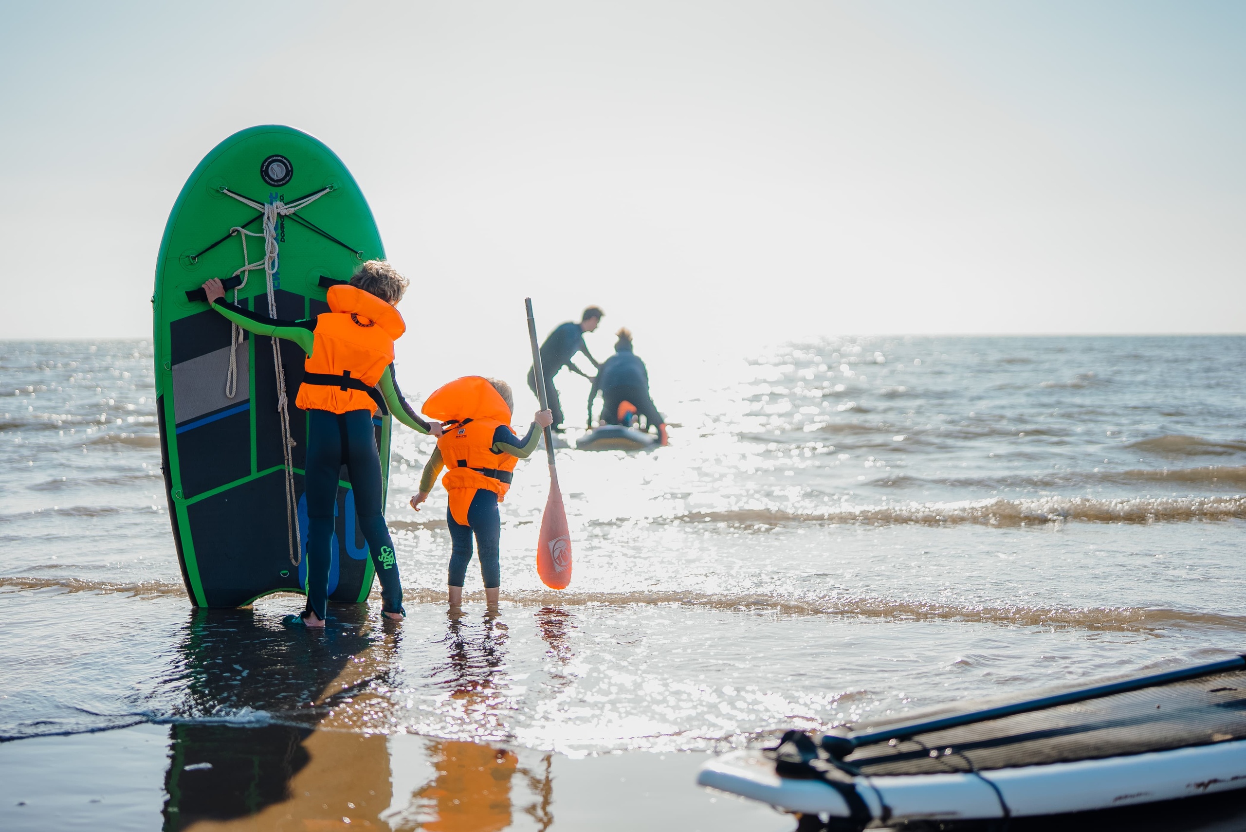 Family paddle boarding