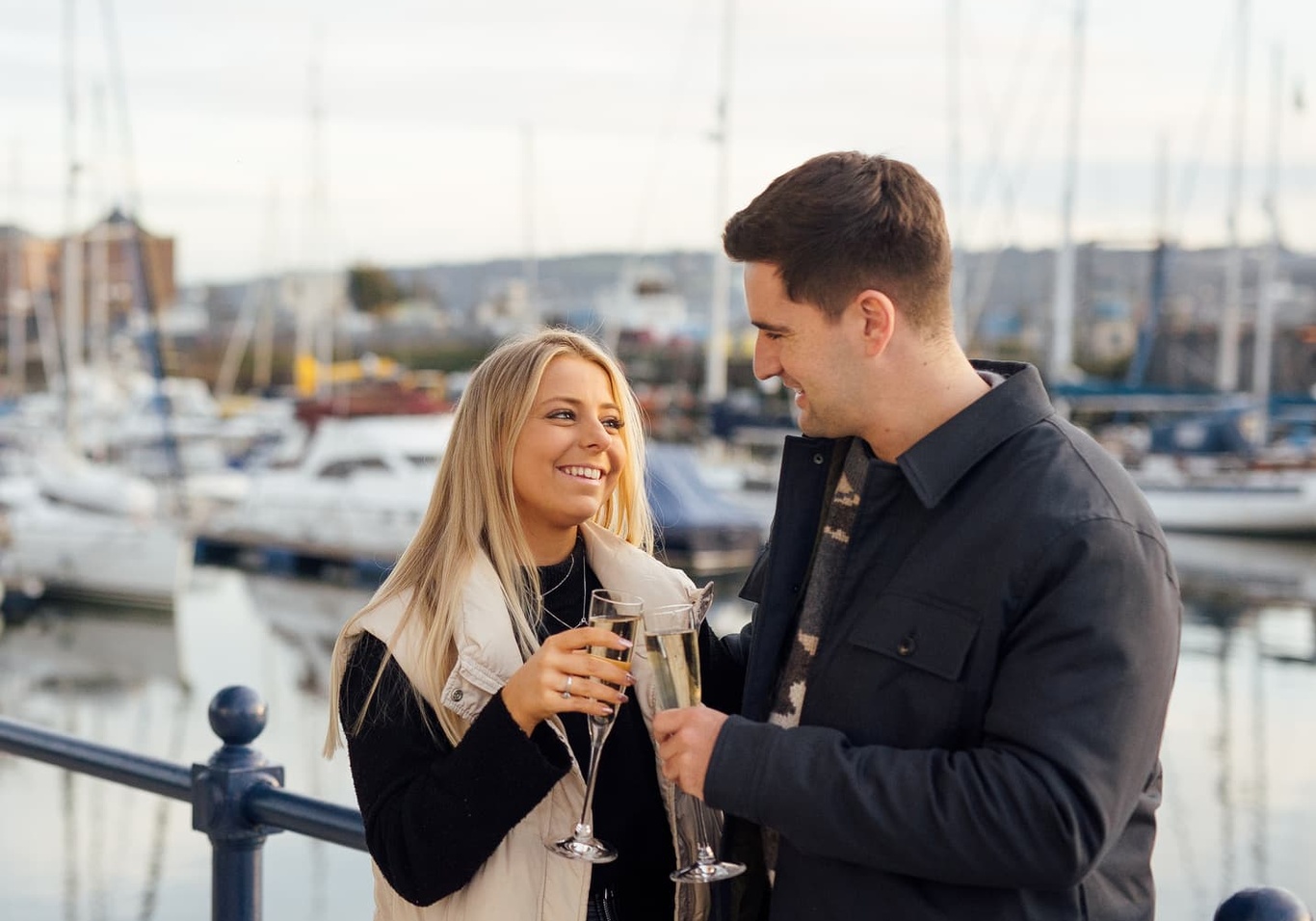 Couple on the Waterfront with Champagne