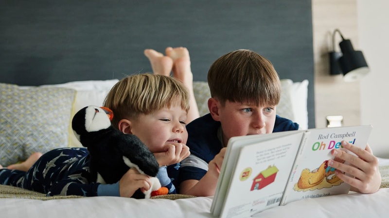 Children Playing in Family Bedroom